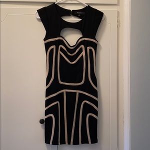 Black cocktail dress with white trim